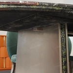 Patchwork Marble Dining Table with Flared Panel Legs and Textured Edge